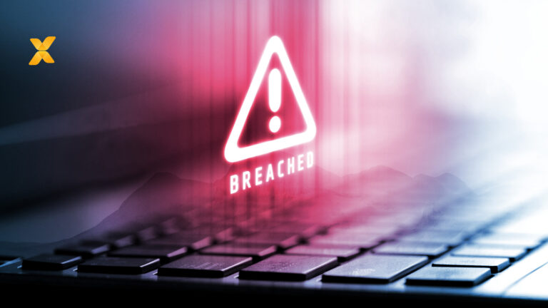 image showing a laptop screen with a warning sign and the word breaches